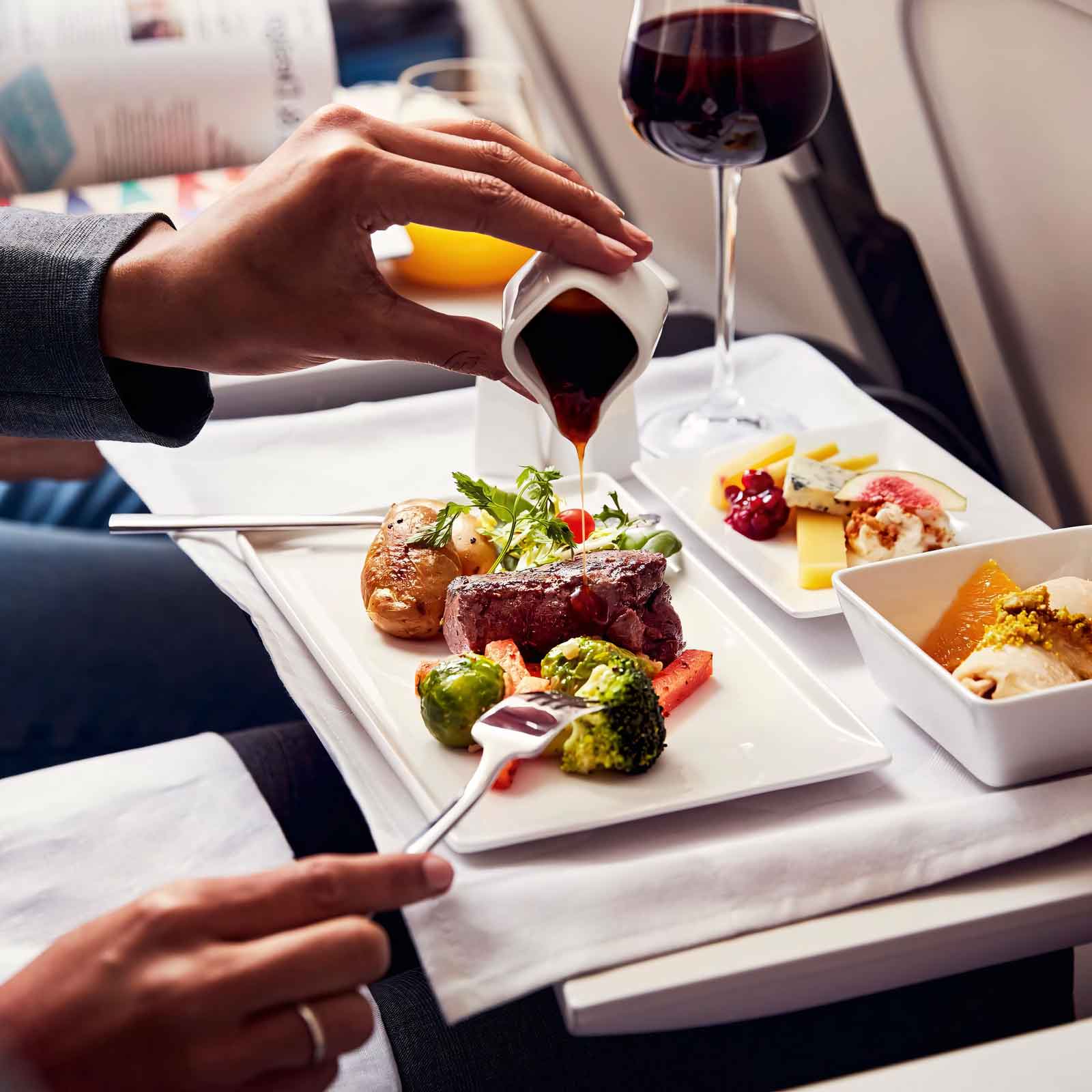 SkyChefs Plated Food on Passenger's Tray Table